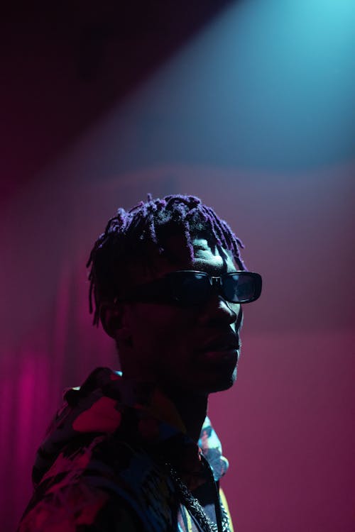 Man in Black Sunglasses with Purple Hair