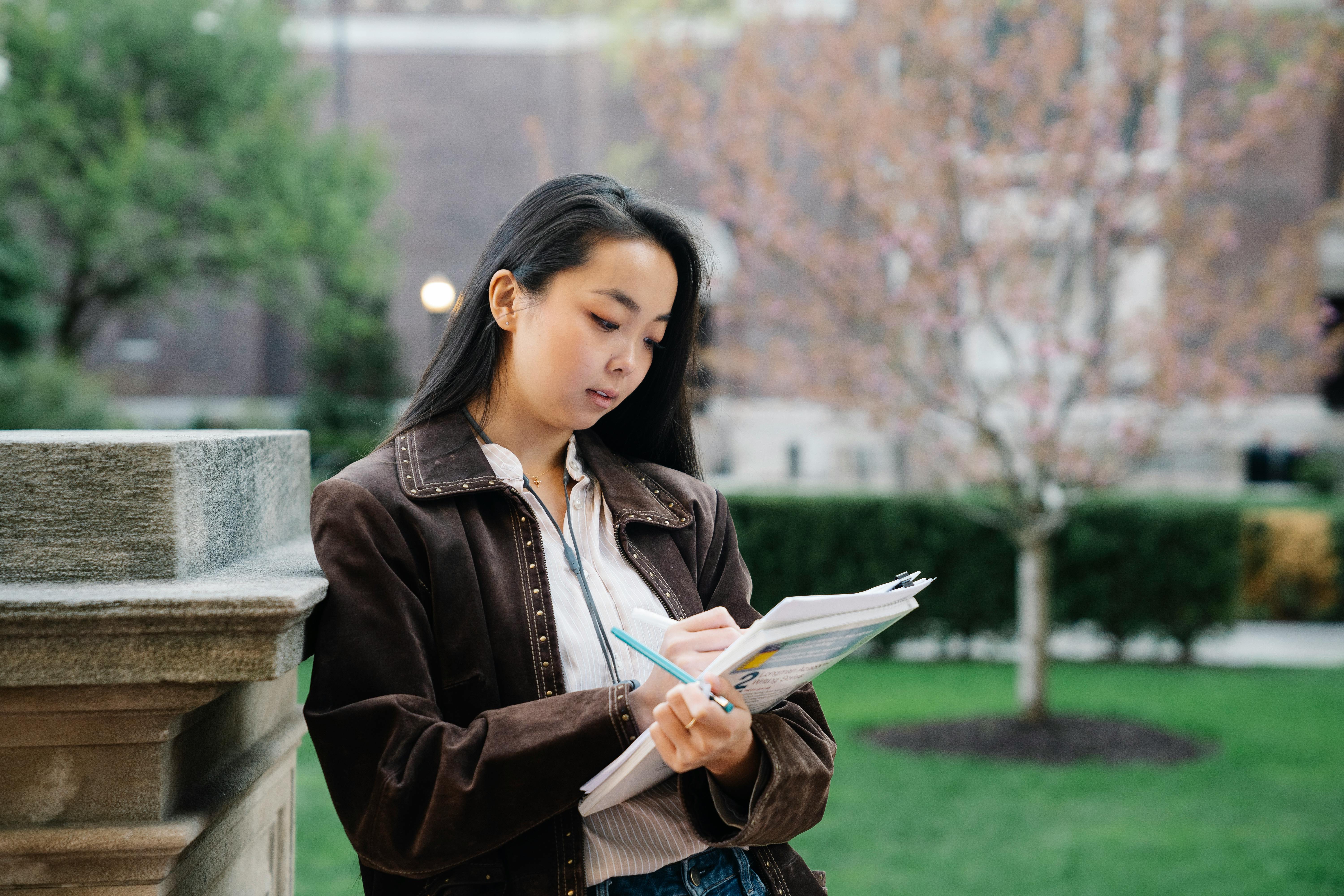 a woman studying papers