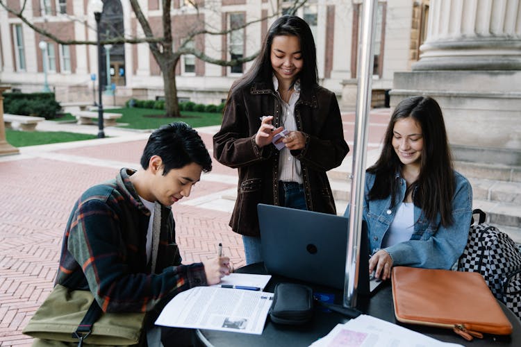 A Group Of Students Studying