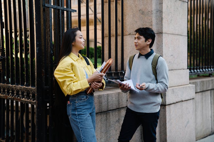 Students Talking In Gate