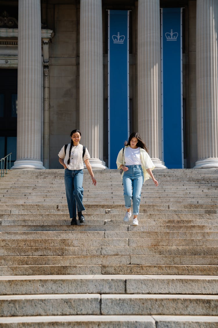 Teenagers Going Down The Stairs