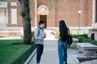 Man and Woman Near Concrete Bench