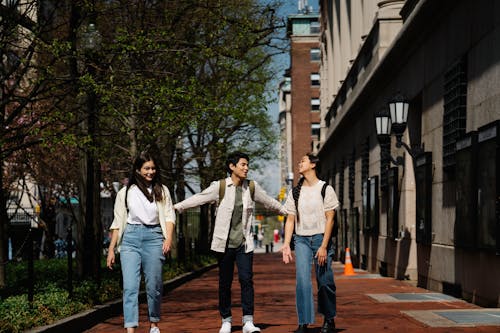 Photo of a Group of Students Walking Together