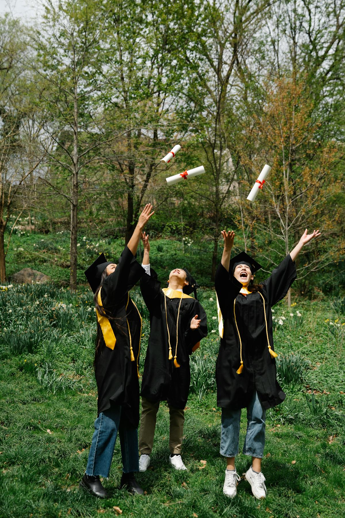 Person organizing tasks on sticky notes and a laptop calendar