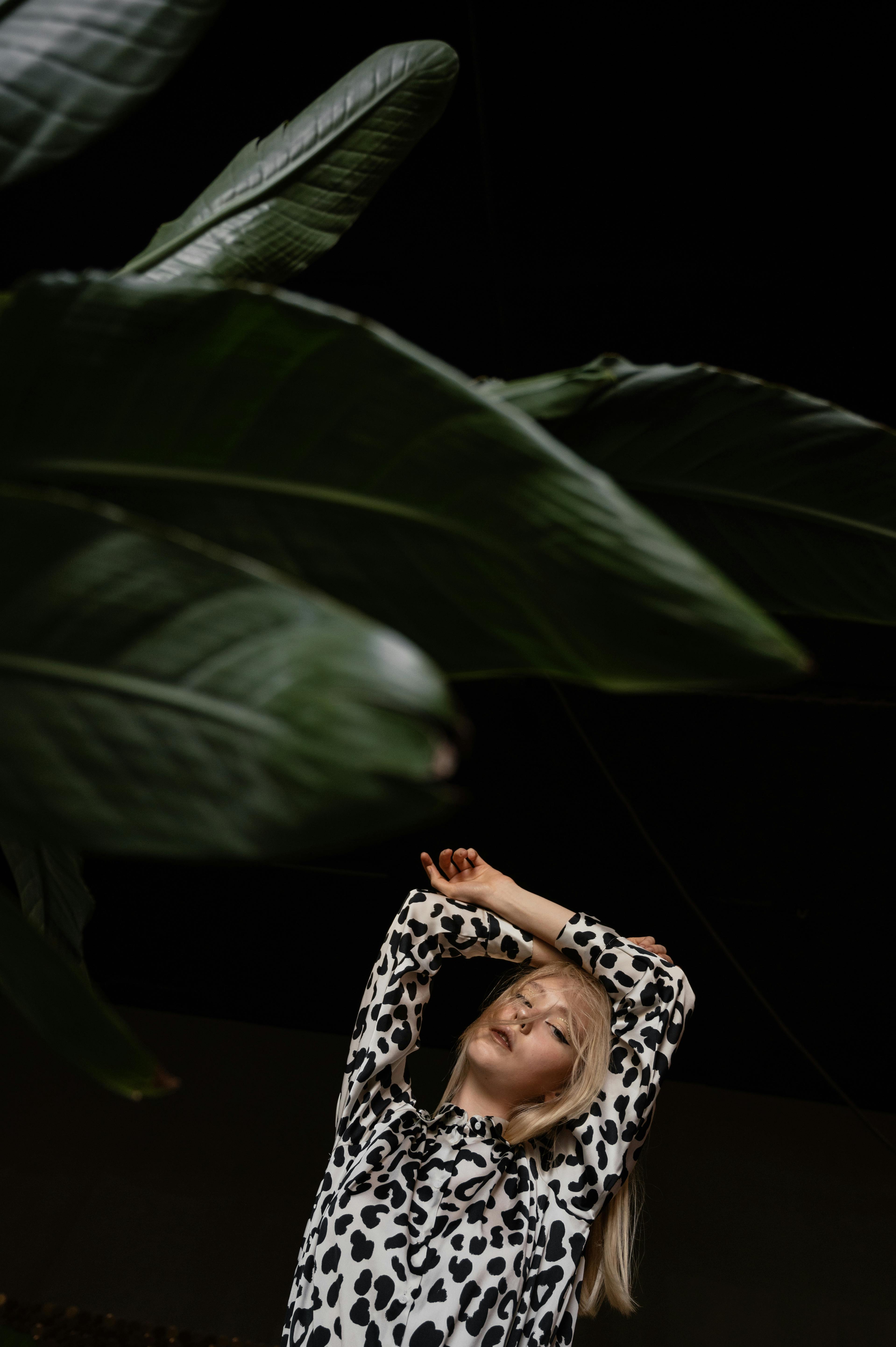 portrait of a female fashion model wearing a dalmatian print top