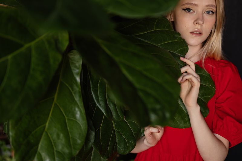Woman in a plant-filled room, photo by SHVETS production on Pexels