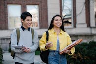 Young Man and Woman Walking Together