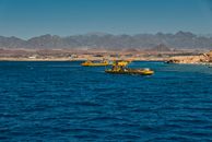 Yellow Watercrafts Against the Background of Mountains and the Sea in Ras Mohammed National Park, Egypt