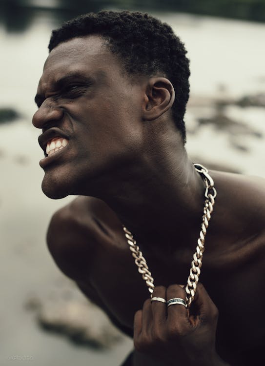 Topless Man With Silver Chain Necklace