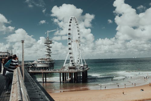 Photos gratuites de architecture, bord de mer, grande roue