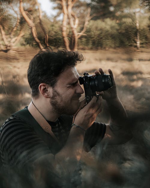 Photographer taking photo of nature