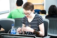 A Female Student Doing an Artwork