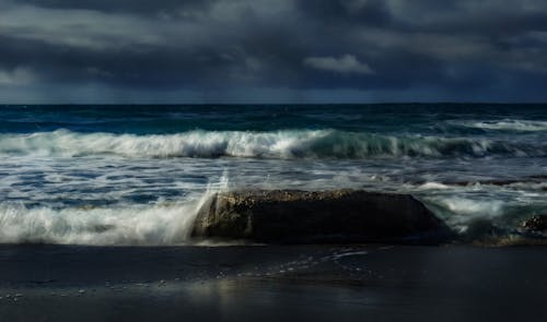 Free Photograph of Ocean Waves Crashing on a Rock Stock Photo