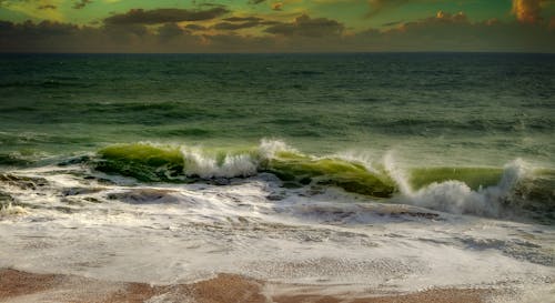 Photograph of Sea Waves Crashing on the Shore                    