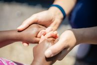 Person Holding Babys Hand