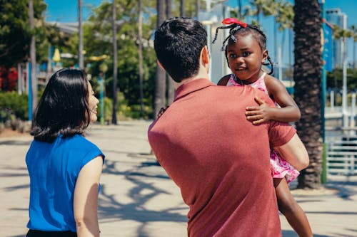 Free A Happy Family Walking Stock Photo