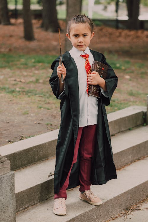 Free A Little Girl In Harry Potter Costume  Stock Photo