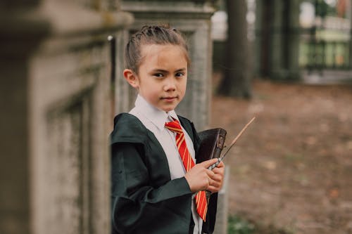A Little Girl in a Harry Potter Costume