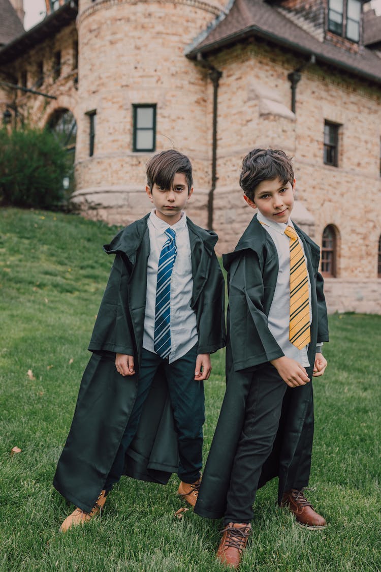 Two Boys In Black Robes