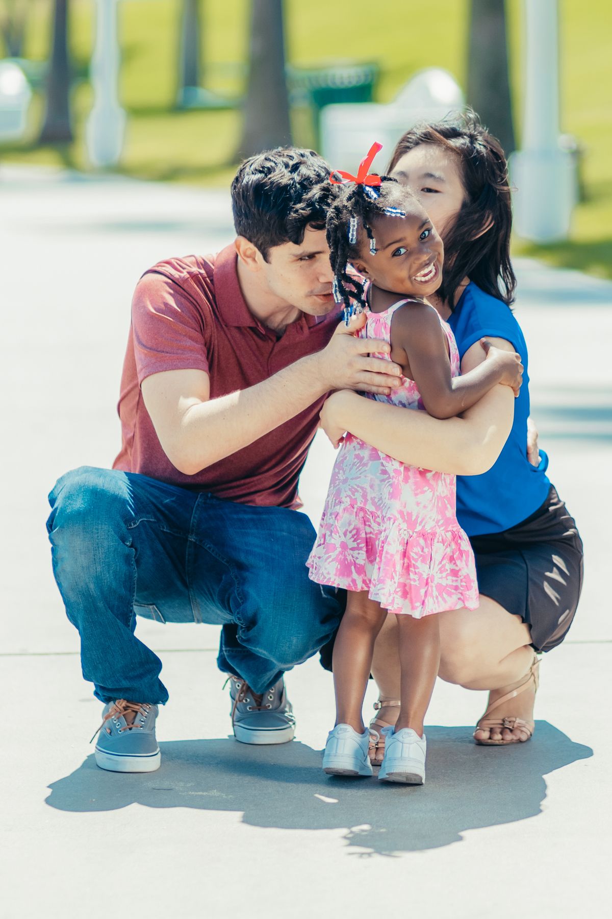 Family embracing outdoors