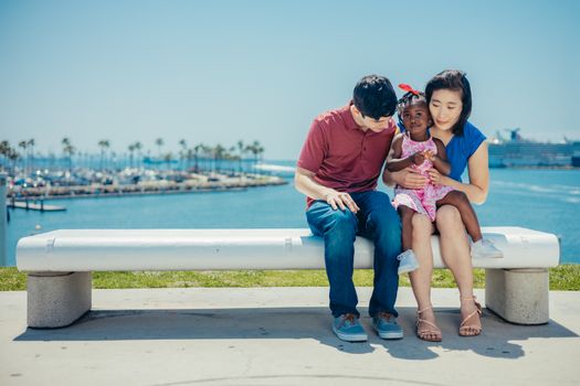 Happy Family sitting near Bay 
