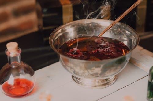 Basin with Melted Candle and Smoke