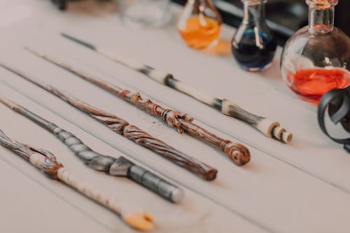 Wooden Sticks on White Wooden Table