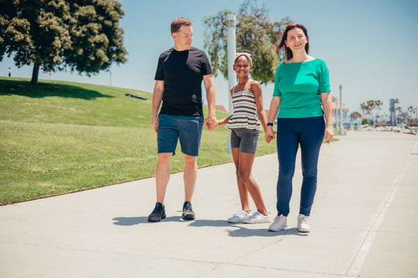 Diverse family walking together