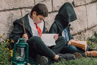 Man with Magic Wand Reading Book