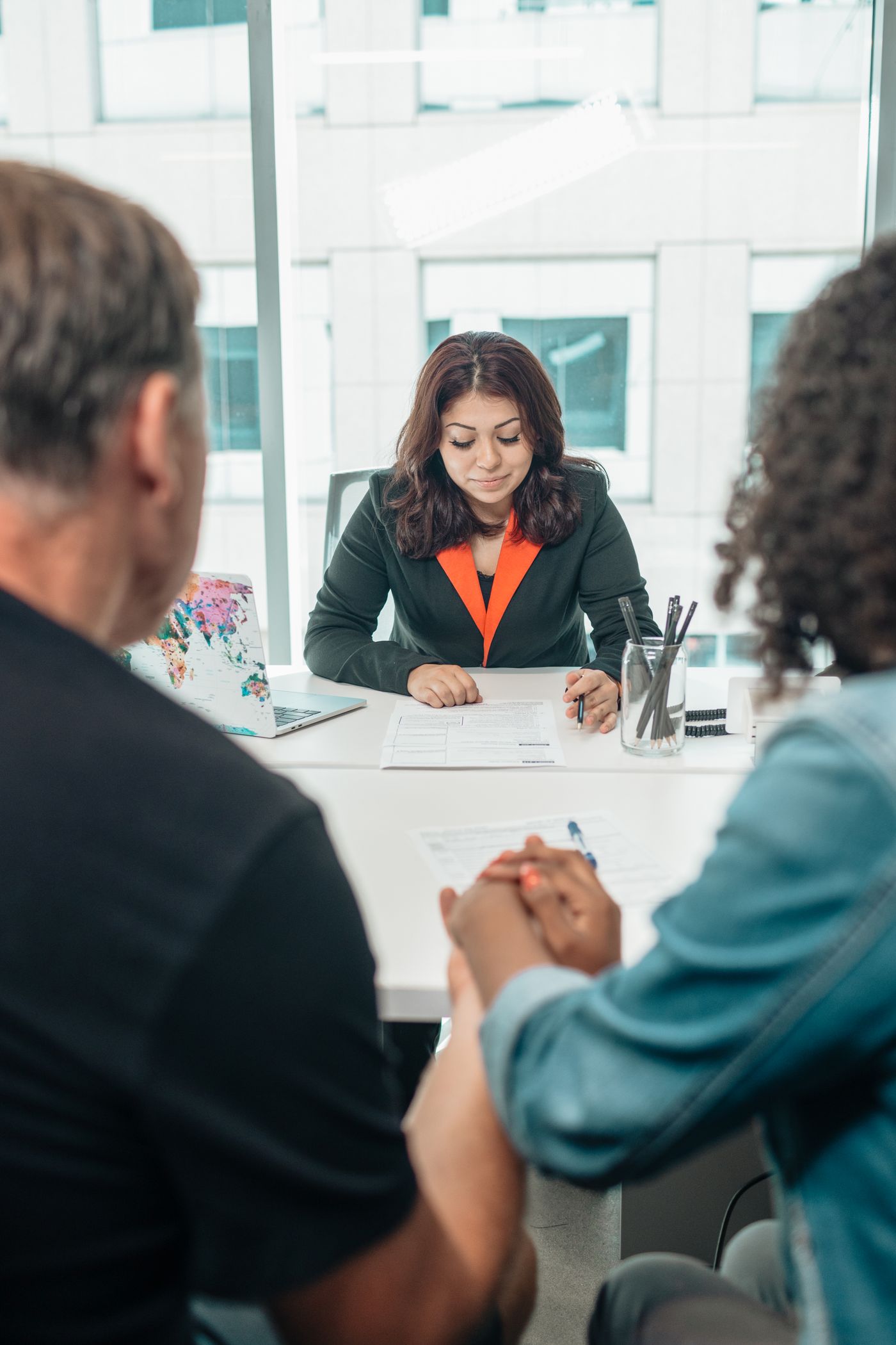 A family meeting with a professional to discuss paperwork