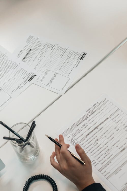 A Person Holding Black Pen