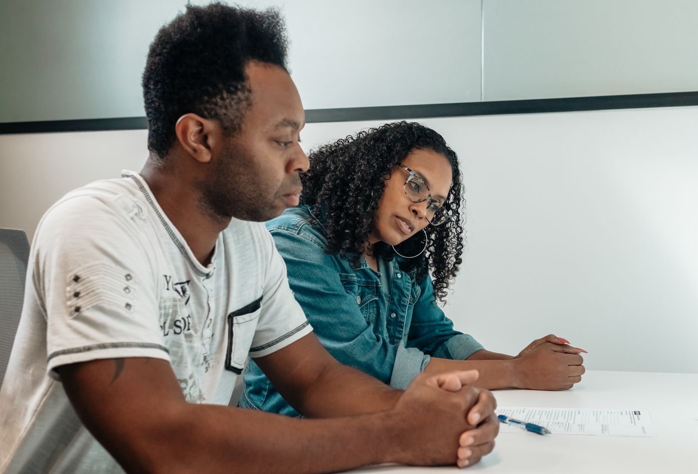 Couple reviewing financial paperwork together