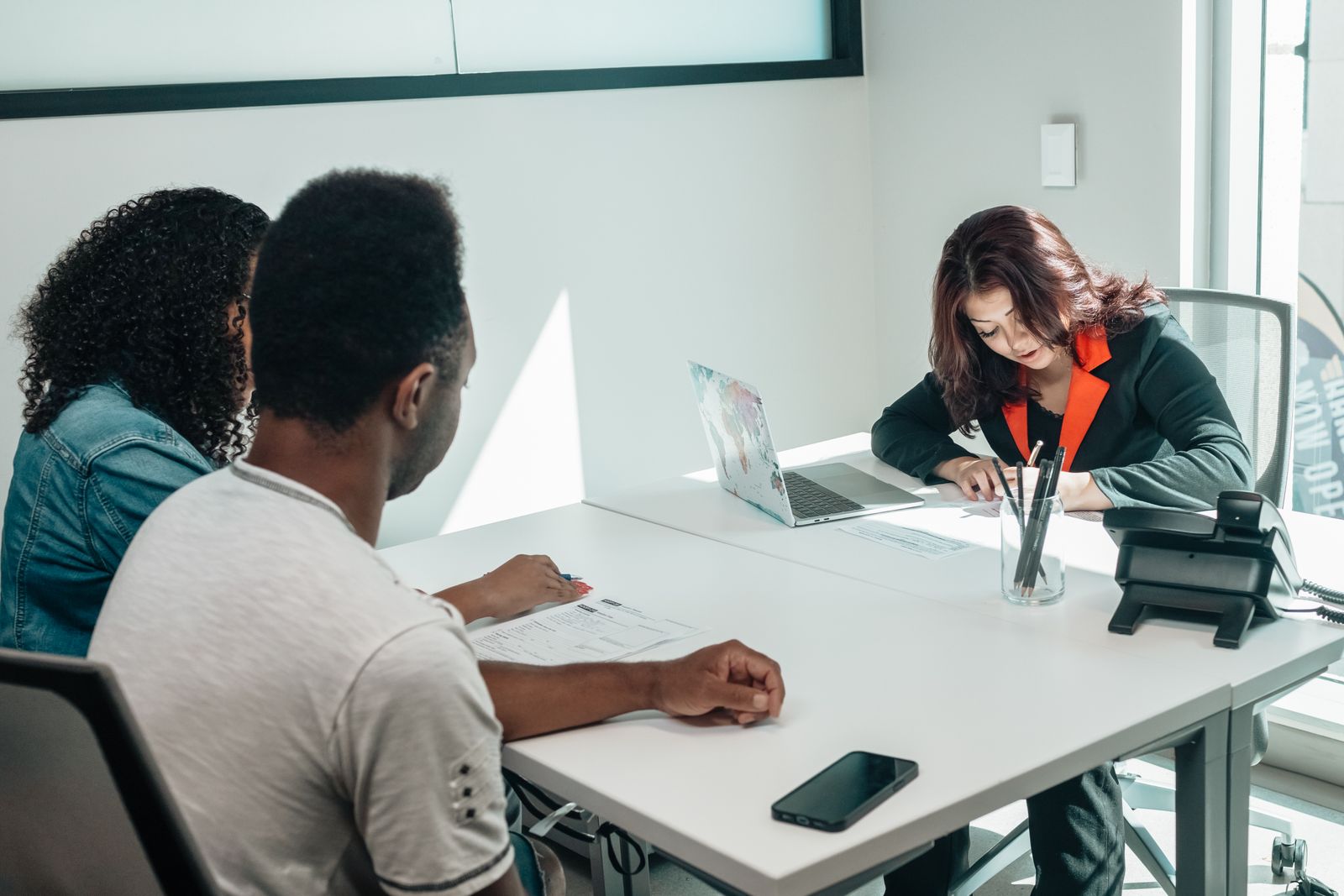 Client speaking with an insurance advisor about coverage options