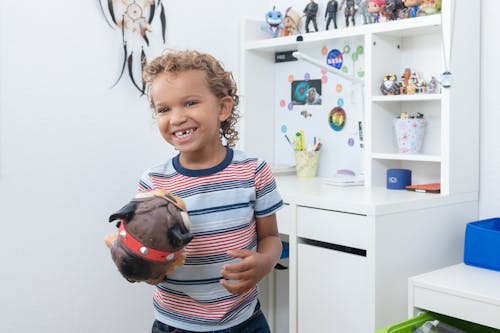 Boy Holding a Toy