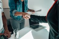 Caucasian and African American People Handshaking