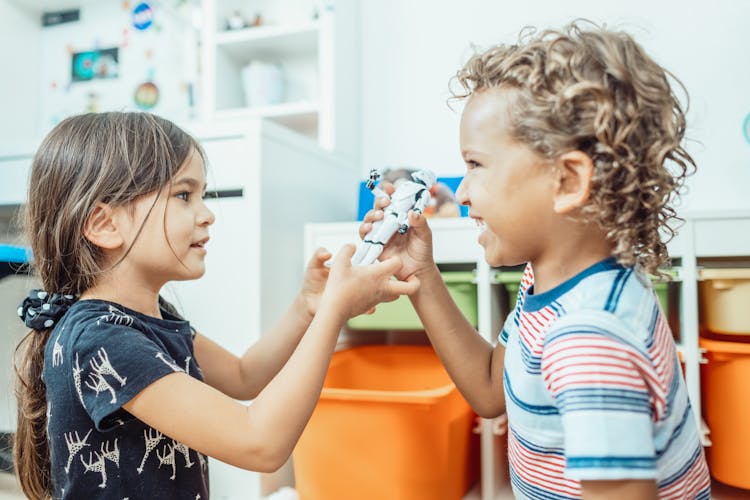 A Boy And Girl Playing Together 