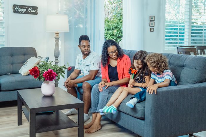 Multiracial family together at home