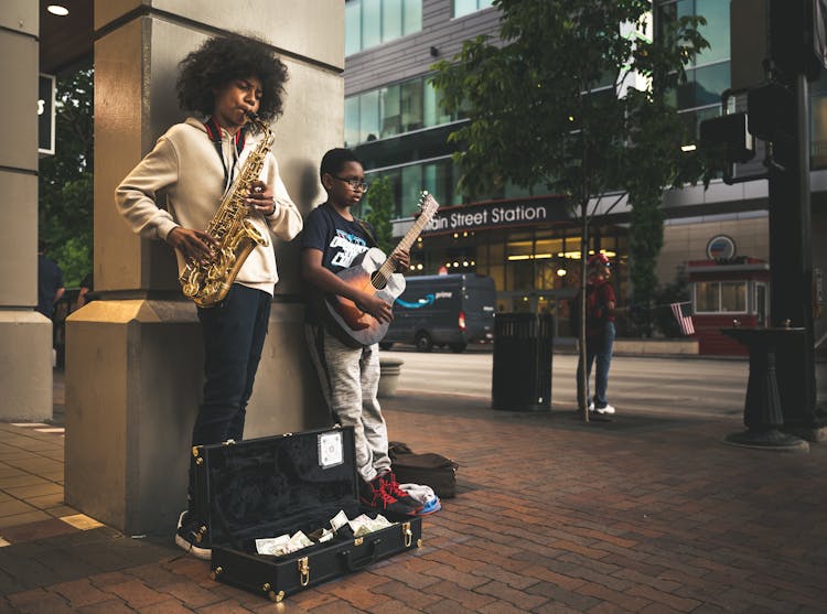 Black Children Musician Playing Song On Street