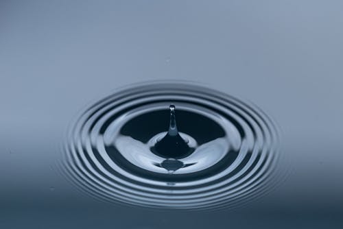 Free Water Drop on Surface Stock Photo