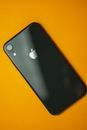 Black Iphone 7 Plus on Orange Table
