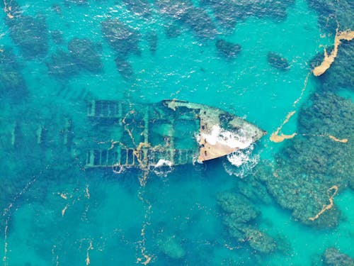 Free Remains of Shipwreck in Turquoise Water Stock Photo