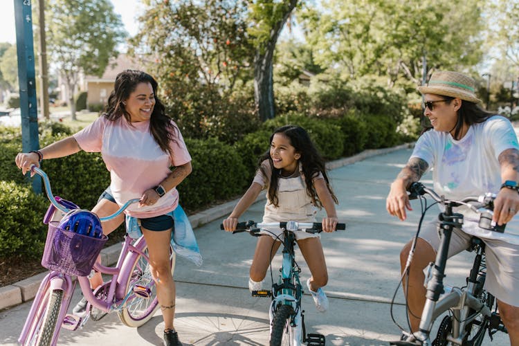 People Riding On Bicycle