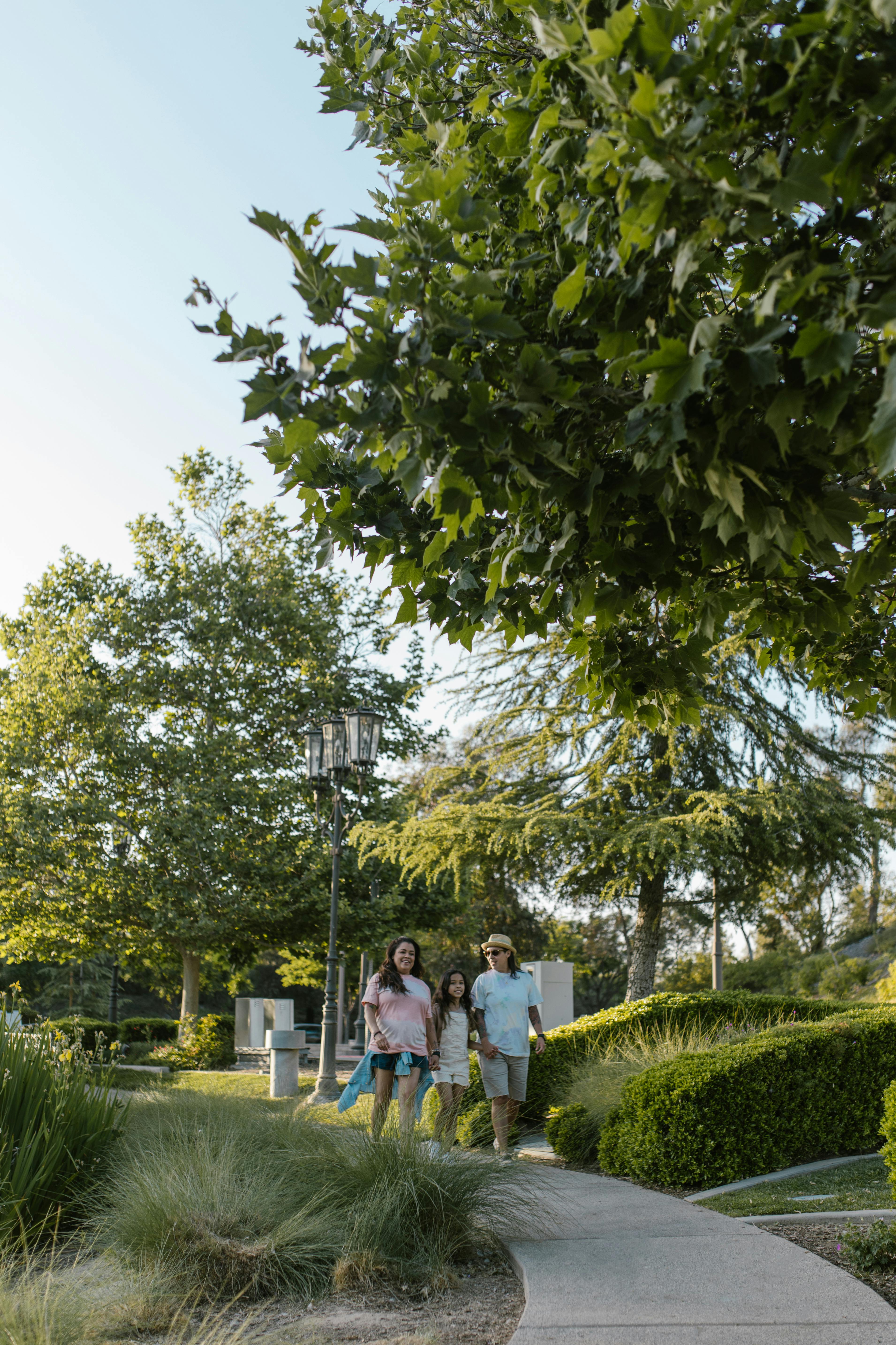 a family taking a walk in the park