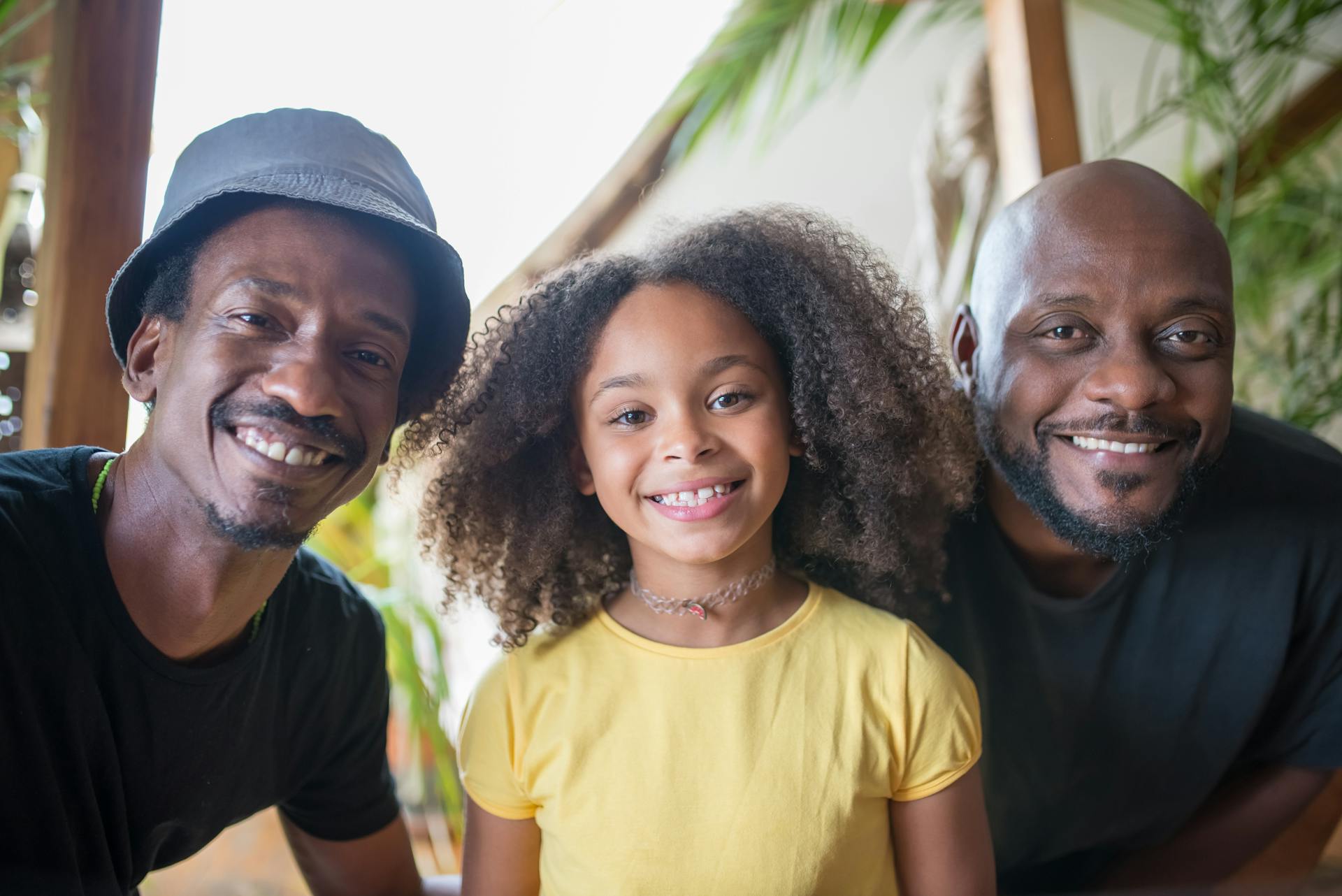 Two Men and a Girl in a Family Picture