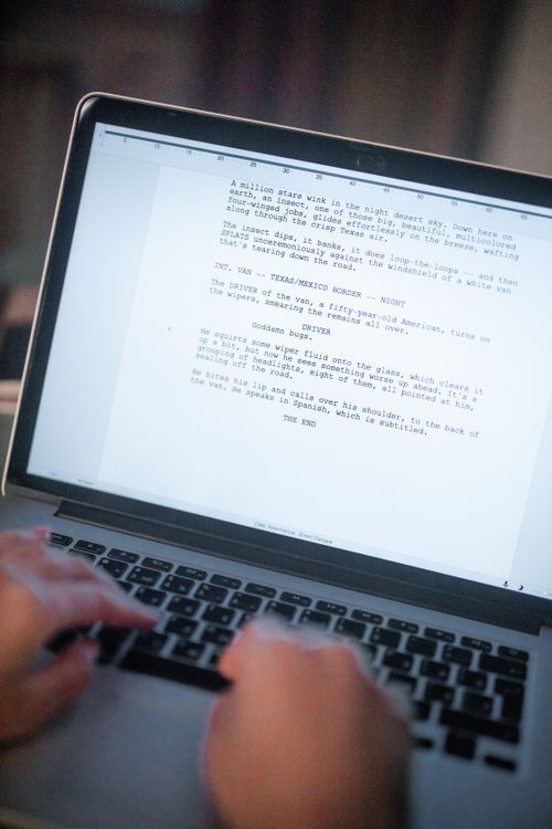 Writing In Computer A Person Typing a Document Using a Laptop · Free Stock Photo