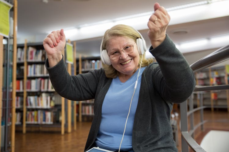 Elderly Woman Listening Music