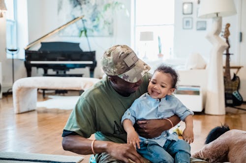 Free A Military Dad Playing with His Son Stock Photo