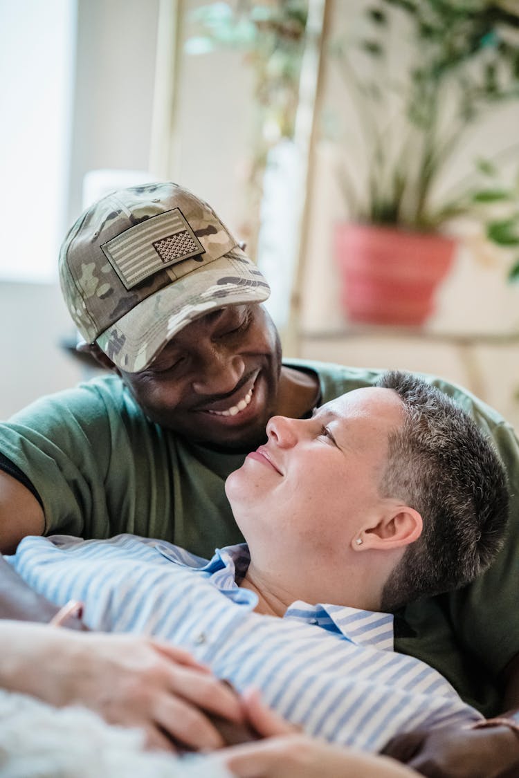 Portrait Of Soldier Embracing Woman