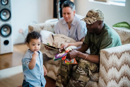 Free Family with Father Soldier at Home Stock Photo