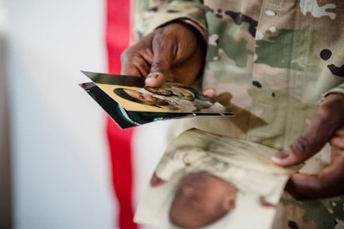 Soldier Looking Through Family Photos